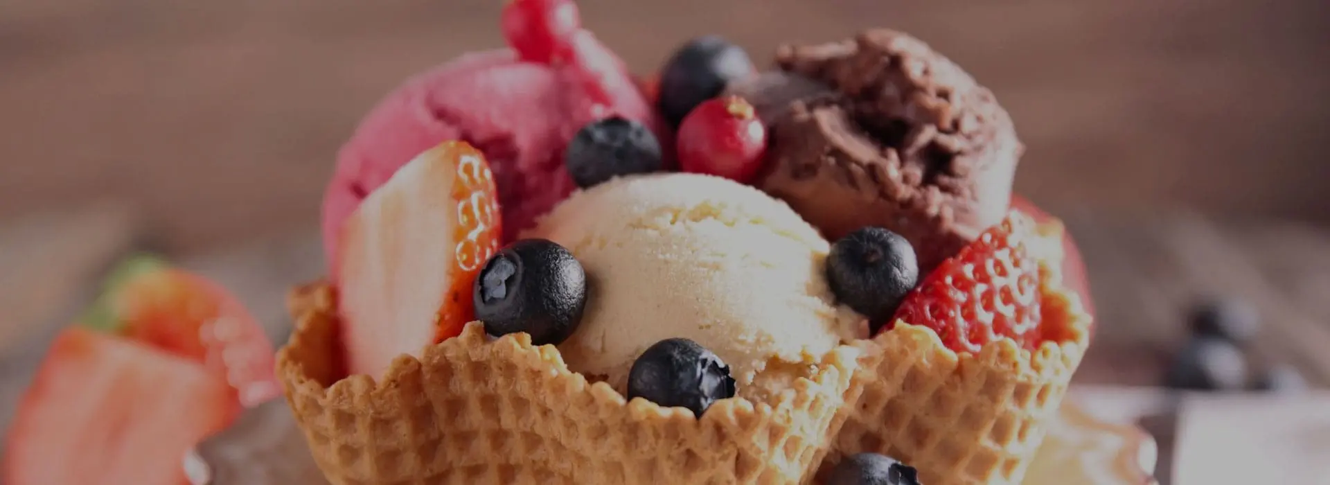 A close up of ice cream and fruit